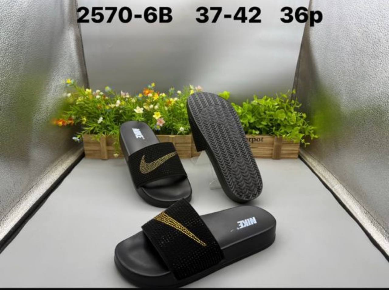 # 0 NIKE SLIPPERS